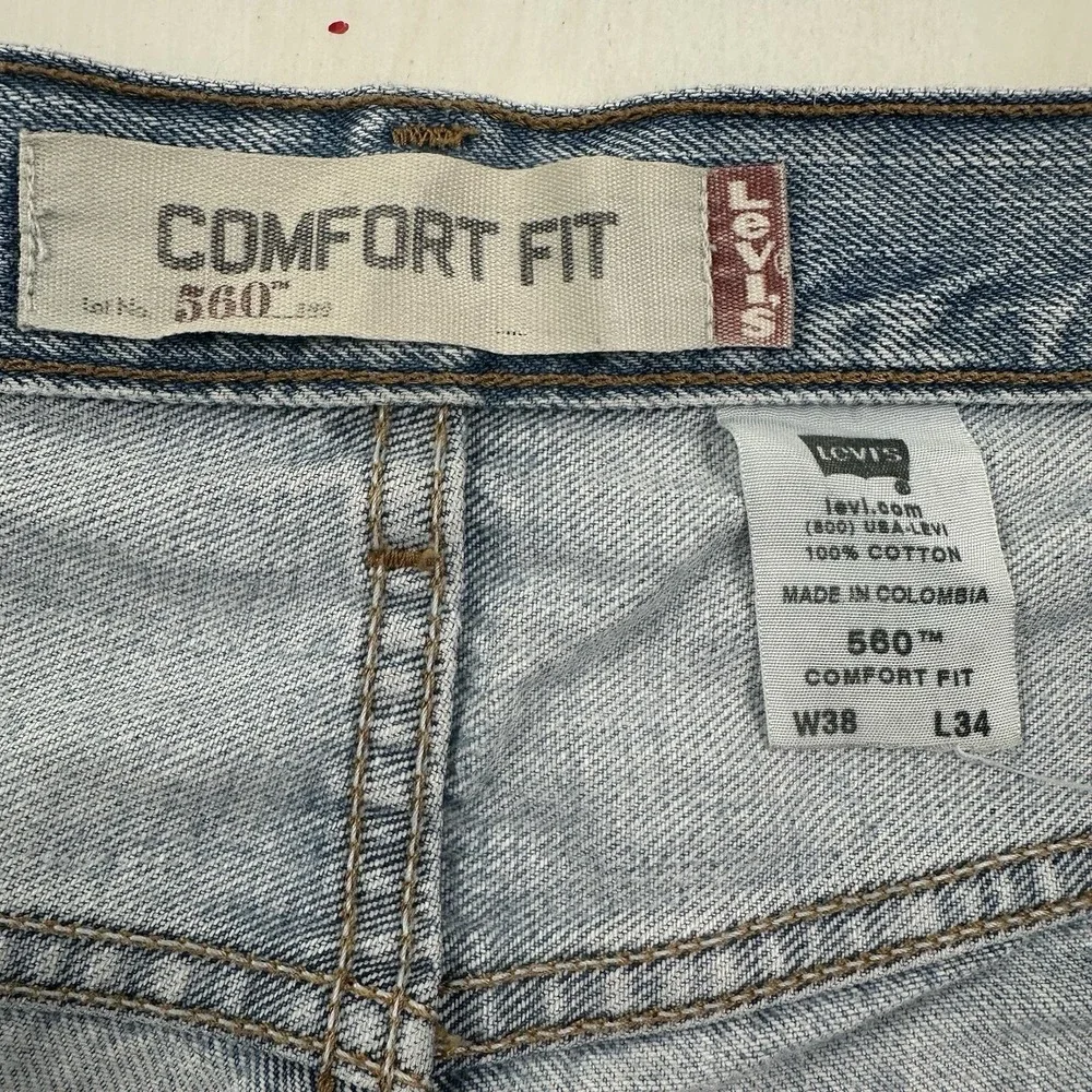VTG‎ Levi's 560 Comfort Fit 38x34 Tapered Loose Jeans Light Wash Distressed Y2K